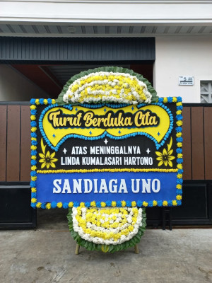Papan Bunga Duka di Puhun Tembok